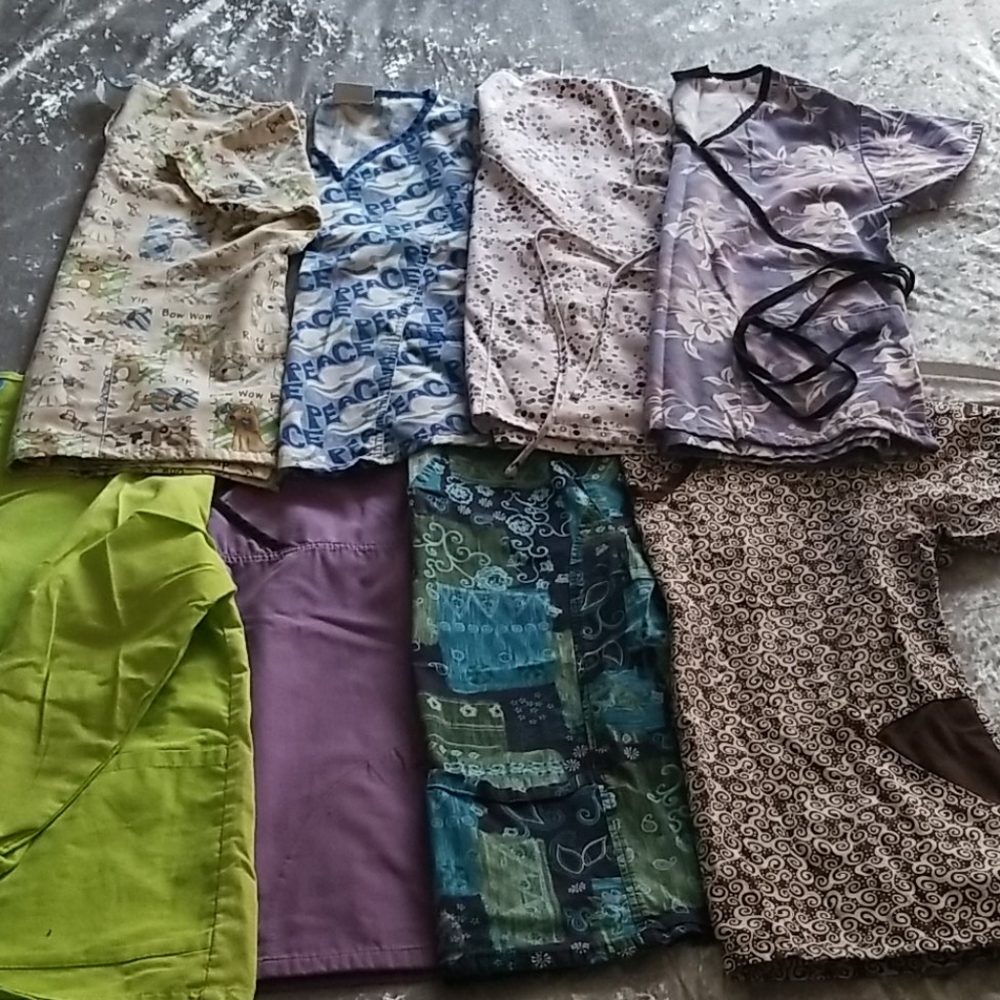 7 small scrub tops & 1 small scrub jacket
